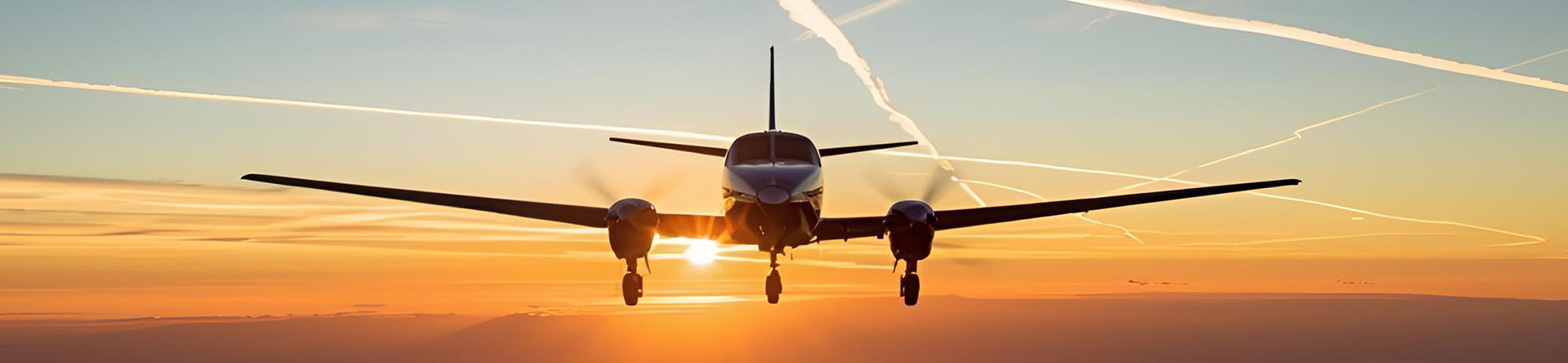 King Air Flying in the sky with sunset